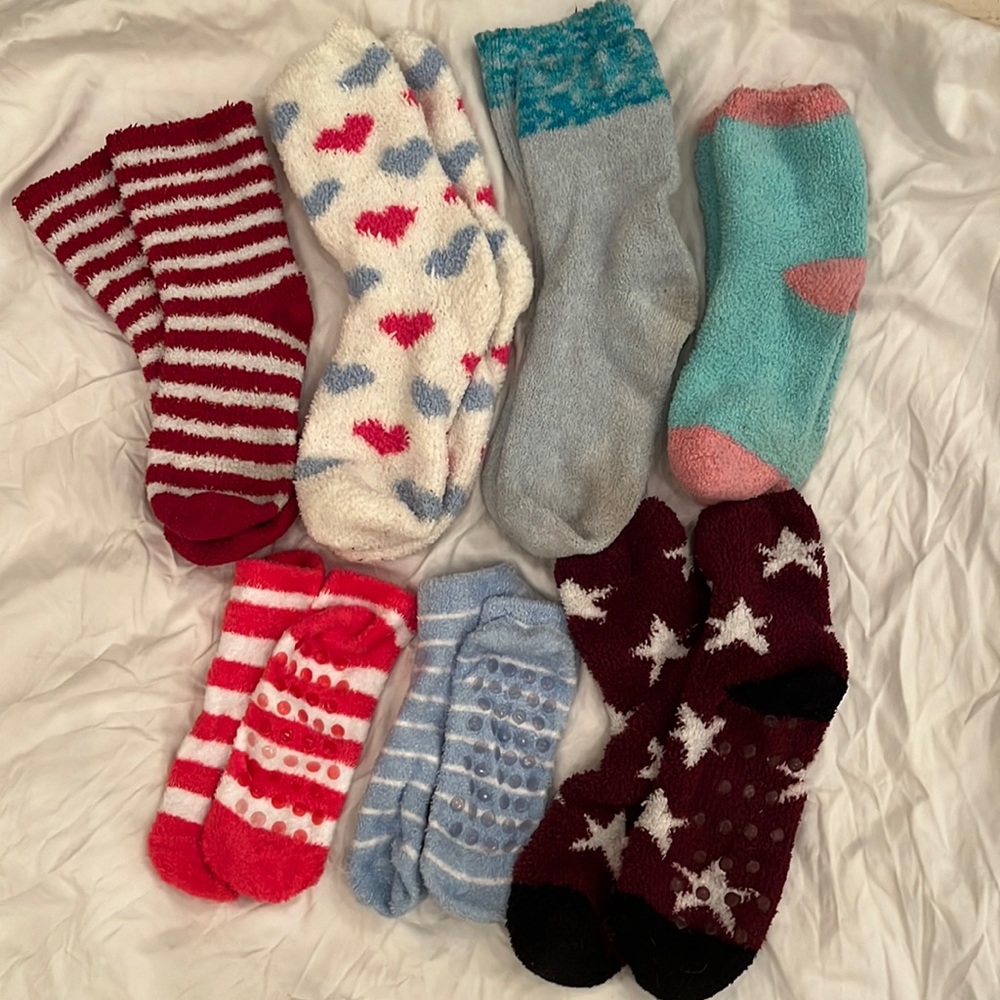 Lot of 7 Pairs of Fuzzy Socks, 3 with grippers on the bottom. Gently Used.